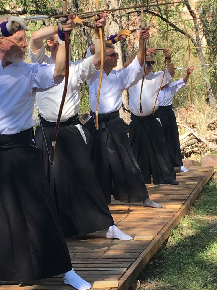 Nestor (center) practicing with others at a retreat in New Mexico. Nestor (center) practicing with others at a retreat in New Mexico.
